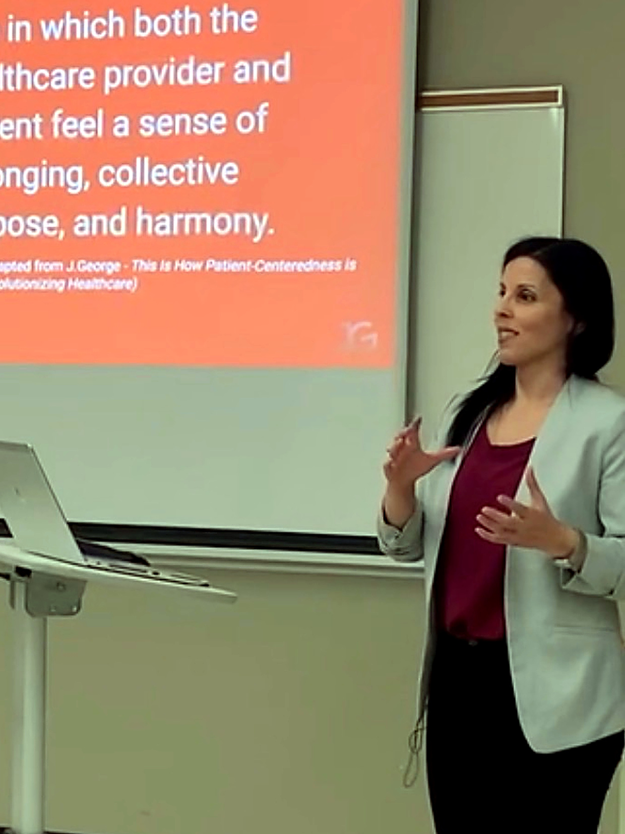 Jennifer George presenting a keynote on patient-centred care and communication